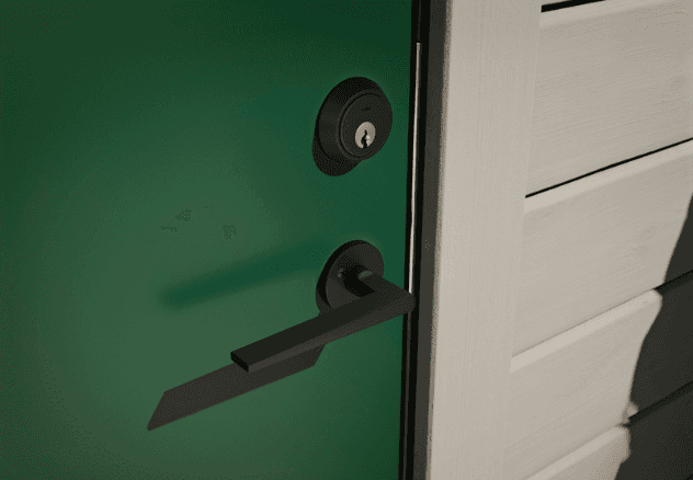 Grønn dør med svart håndtak