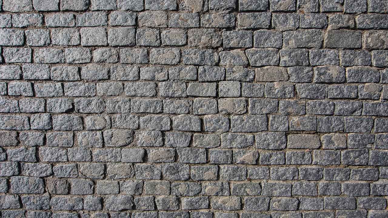 Nærbilde av brostein gårdsplass.